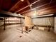 Unfinished basement is ready to be designed to your preferences and has exposed wood ceiling and concrete floor at 7195 E Louisiana Ave, Denver, CO 80224