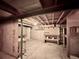 Unfinished basement is ready to be designed to your preferences and has exposed wood ceiling and concrete floor at 7195 E Louisiana Ave, Denver, CO 80224