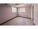 Basement bedroom with carpet and a window at 7195 E Louisiana Ave, Denver, CO 80224
