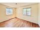 Bedroom with two windows and hardwood floors at 7195 E Louisiana Ave, Denver, CO 80224
