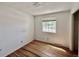 Bedroom with one window and hardwood floors at 7195 E Louisiana Ave, Denver, CO 80224