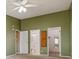Large carpeted bedroom leads to attached bathroom and closet space at 3022 S Wheeling Way # 407, Aurora, CO 80014