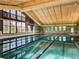 Bright indoor pool area with large windows, perfect for year-round swimming and relaxation at 3022 S Wheeling Way # 407, Aurora, CO 80014