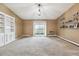 Spacious living room with sliding glass doors leading to outdoor balcony at 3022 S Wheeling Way # 407, Aurora, CO 80014