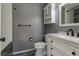 Bathroom with updated vanity and modern finishes at 1869 S Union Blvd, Lakewood, CO 80228