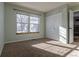 Bright bedroom with double closets and carpet flooring at 1869 S Union Blvd, Lakewood, CO 80228