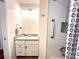 Charming bathroom vanity, offering a clean, bright aesthetic with fresh fixtures at 2285 S Knox Ct, Denver, CO 80219