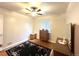 Cozy bedroom with hardwood floors and a ceiling fan for added comfort at 2285 S Knox Ct, Denver, CO 80219