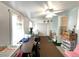 Sunroom filled with natural light offering versatile space for relaxation and hobbies at 2285 S Knox Ct, Denver, CO 80219