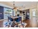 Dining area with stylish rug is adjacent to a bright kitchen, perfect for meals and gatherings at 2235 S Cherokee St, Denver, CO 80223