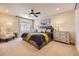 Serene main bedroom showcases a plush bed, ambient lighting, and elegant decor for a relaxing retreat at 2235 S Cherokee St, Denver, CO 80223