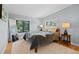 Bright bedroom with comfortable bed, natural light, and cozy decor. Perfect for rest and relaxation at 1485 S Jasmine Way, Denver, CO 80224