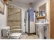 Bathroom with walk-in shower and pedestal sink at 2825 Elm Ave, Boulder, CO 80305