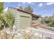 Ranch home with a detached garage and a stone pathway at 2825 Elm Ave, Boulder, CO 80305