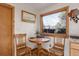 Charming kitchen nook with wood table and chairs at 2825 Elm Ave, Boulder, CO 80305