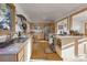 Open concept kitchen with island and stainless steel appliances at 2825 Elm Ave, Boulder, CO 80305