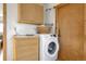 Laundry room with washer, dryer, and cabinets at 2825 Elm Ave, Boulder, CO 80305