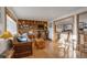 Cozy living room with built-in shelves and hardwood floors at 2825 Elm Ave, Boulder, CO 80305