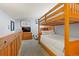 Upstairs bedroom with bunk beds and a full bed at 405 Four Oclock Rd # 12F, Breckenridge, CO 80424