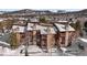 Exterior view of building showcasing unique architecture and snowy landscape at 405 Four Oclock Rd # 12F, Breckenridge, CO 80424