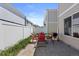 Backyard features a patio with outdoor dining and grilling area at 19817 E 47Th Pl, Denver, CO 80249