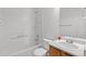 Bathroom featuring a tub/shower, toilet, and vanity with ample counter space at 19817 E 47Th Pl, Denver, CO 80249