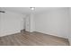 Bright bedroom features wood-look flooring and a large closet for ample storage space at 19817 E 47Th Pl, Denver, CO 80249
