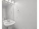 Powder room featuring a modern sink and vanity, with bright lighting at 19817 E 47Th Pl, Denver, CO 80249