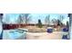 Backyard with hot tub, grill, and landscaping ready for entertaining at 596 Trumbull Ln, Monument, CO 80132