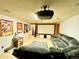 Basement home theater with projector, large screen, comfortable seating, and decor at 596 Trumbull Ln, Monument, CO 80132