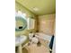 Cozy bathroom featuring a soaking tub, vanity, and tiled walls at 596 Trumbull Ln, Monument, CO 80132