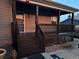 Inviting front porch with steps and railing, perfect for relaxing and enjoying the outdoors at 596 Trumbull Ln, Monument, CO 80132