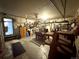 A cluttered garage space with storage shelves, tools, and a workspace for projects at 596 Trumbull Ln, Monument, CO 80132