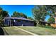 Spacious backyard with lush green lawn, perfect for outdoor activities and relaxation at 5567 E Asbury Ave, Denver, CO 80222