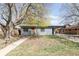 Charming single story home with mature landscaping and covered parking space at 5567 E Asbury Ave, Denver, CO 80222