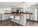 Bright, renovated kitchen featuring butcher block counters, modern appliances, and ample cabinet space at 8065 Clay St, Westminster, CO 80031