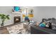 Living room showcases a fireplace, large windows, and modern decor for a cozy aesthetic at 8065 Clay St, Westminster, CO 80031