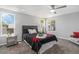 Well-lit main bedroom showcasing a cozy bed and furnishings for a restful retreat at 8065 Clay St, Westminster, CO 80031