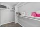 Walk-in closet with shelves for shoes and storage of purses and other personal items at 8065 Clay St, Westminster, CO 80031