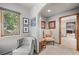 Cozy sitting area with comfortable chairs and natural light, creating a relaxing space within the home at 394 S Ponderosa Way, Evergreen, CO 80439