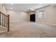Finished basement features neutral carpet and window for natural light at 13986 Lexington Dr, Parker, CO 80134