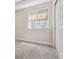 Basement room with a window and closet at 13986 Lexington Dr, Parker, CO 80134
