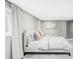 Serene bedroom featuring neutral tones, a comfortable bed, and soft natural light at 1 Sedgwick Dr, Cherry Hills Village, CO 80113