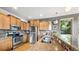 Well-appointed kitchen with granite countertops, stainless steel appliances, and modern cabinetry at 396 E Warren Ave, Denver, CO 80210