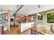 Charming kitchen featuring wooden cabinetry and dining area with natural light at 396 E Warren Ave, Denver, CO 80210