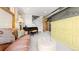Living room with lots of natural light, a baby grand piano, and carpet floors at 396 E Warren Ave, Denver, CO 80210