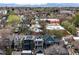 Aerial view of an attractive community with lovely mature trees and green space in the city at 3540 Pecos St, Denver, CO 80211
