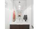 Modern bathroom featuring sleek vanity, stylish mirror, and elegant lighting at 3540 Pecos St, Denver, CO 80211
