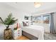 Inviting bedroom with natural light, stylish decor, and hardwood floors at 3540 Pecos St, Denver, CO 80211