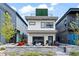 Modern home featuring a cozy front patio with ample seating and stylish decor at 3540 Pecos St, Denver, CO 80211